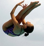 Diving Tuck PIM 012  MICHELLE MENDONCA completes a tuck during the middle of her dive in a high school competition. - PhotosinMotion.net. : MICHELLE MENDONCA diving pictures, high school diving, high school sports, sports pictures Tampa, Clearwater Sports photographer, Photosinmotion.net